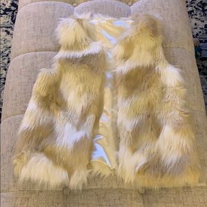 Women’s Size Medium fur vest. NWOT.
